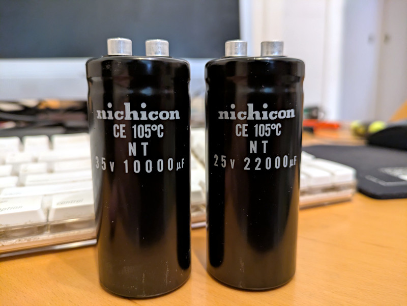 [Really bad picture of the new large capacitors.]