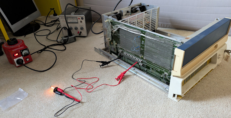 [Really bad picture of the chassis running with a lamp as a load.]