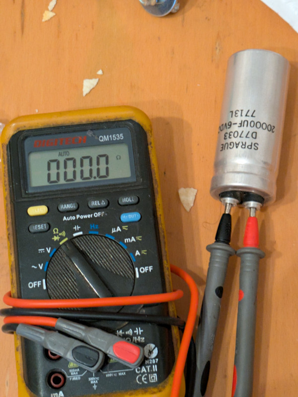 [Really bad picture of the shorted capacitor.]